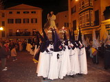 las cofradias cristianas portan el paso en la precesion de semana santa para hacer el paseo a la virgen o el cristo